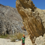 Mary prevents a large rock from teetering over - Domelands Anza Borrego